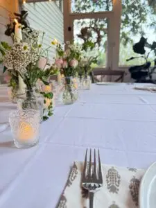 Beautiful dinner table with flowers and candles
