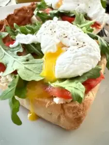 Brunch dish poached eggs on ciabatta bread