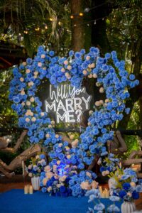 How to plan engagement party: A stress-free guide (how to plan engagement party) 1 plan engagement party Large flower heart with will you marry sign